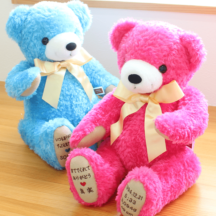 赤ちゃんも大好きな、はっきりしたお色。シャンパンゴールドのリボンがお似合い♪